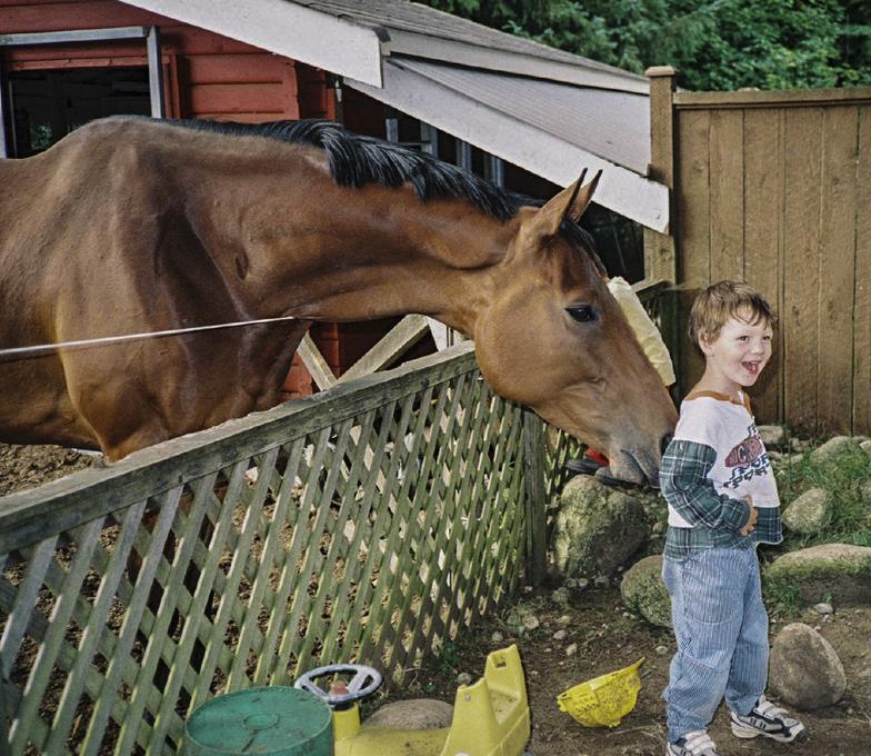 Rhyly Playng with Horse 2001.tif